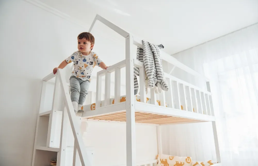 Toddler in a bunk bed