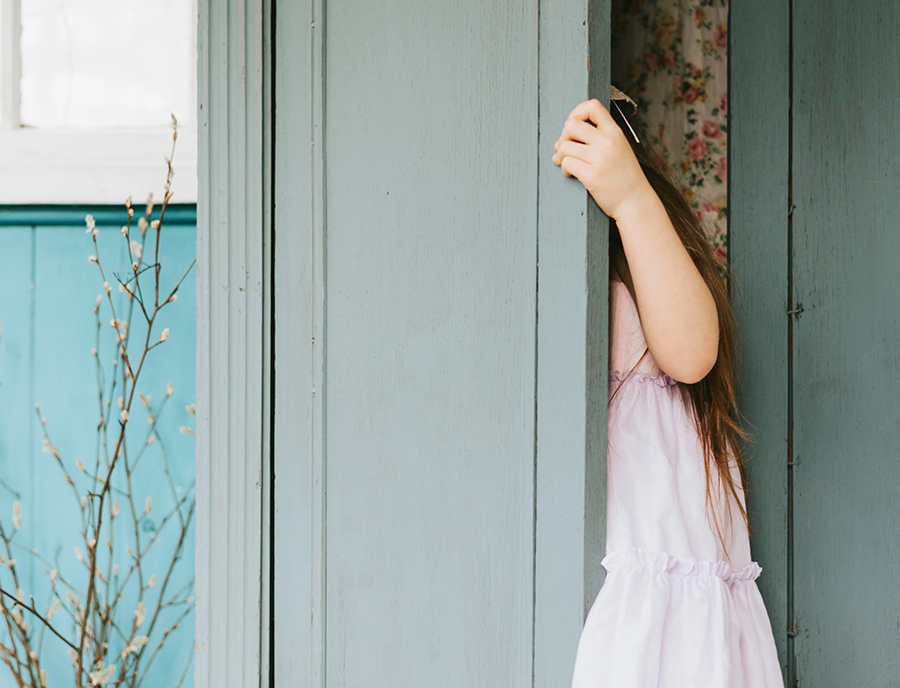 Girl entering a doorway